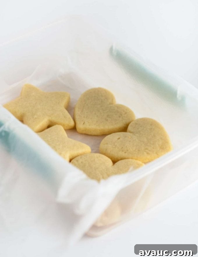 Container of shaped baked sugar cookies