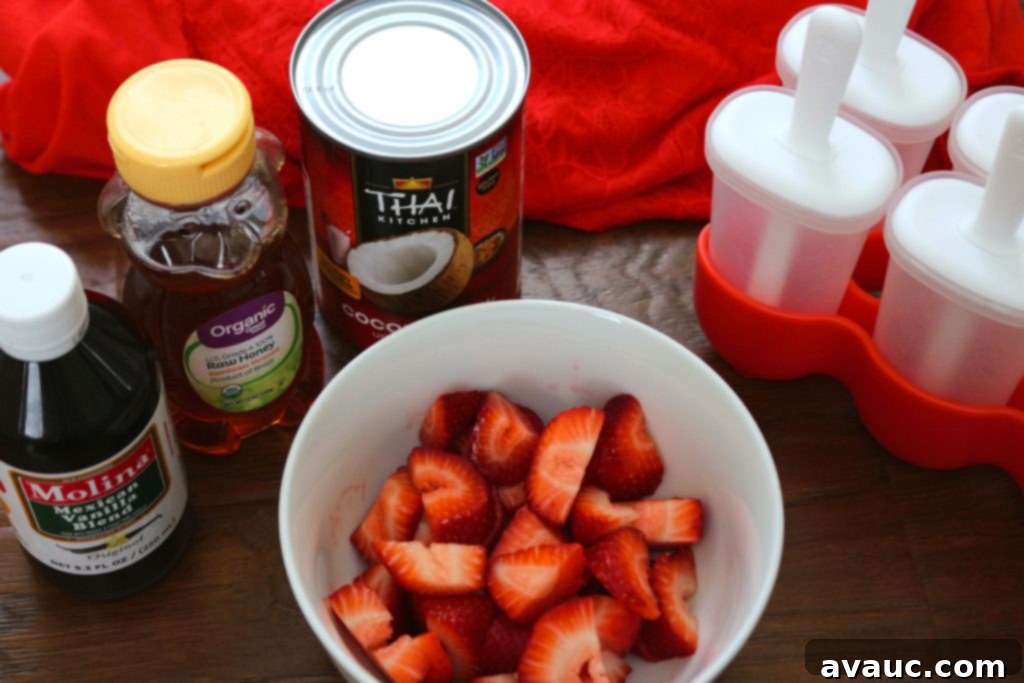 Ingredients for strawberry-cream paletas (popsicles)