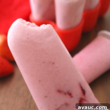 Strawberry Coconut Bliss Bars 9 Strawberry-Coconut Cream Paletas (popsicles) #strawberrycreampaletas #strawberrycreampopsicles #popsicles