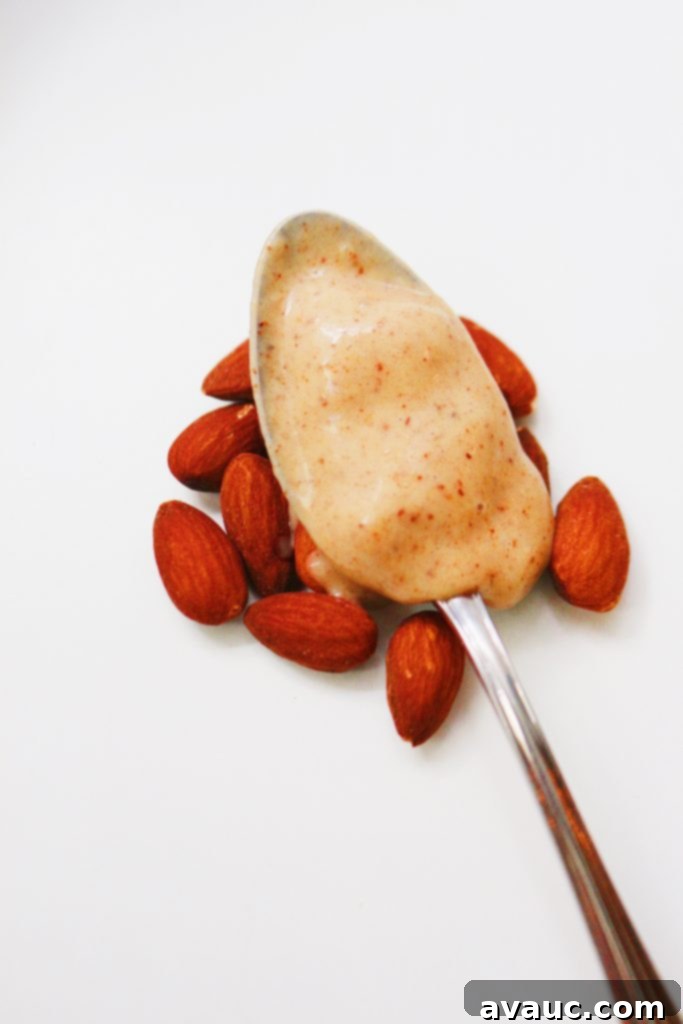 Two bowls of homemade no-churn banana-almond butter ice cream ready to be enjoyed.