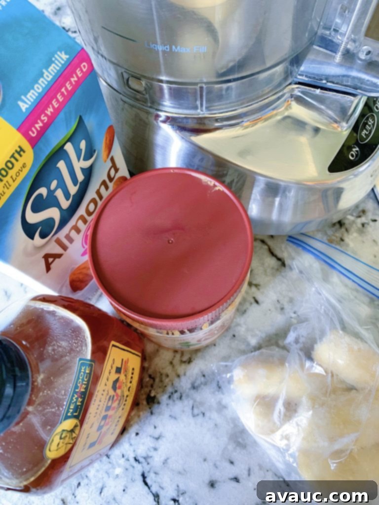 Ripe bananas, almond butter, almond milk, and honey, the simple ingredients for no-churn banana-almond butter ice cream.