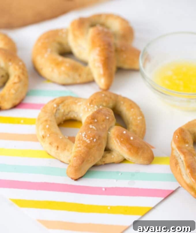 Homemade soft pretzels brushed with butter and sprinkled with salt
