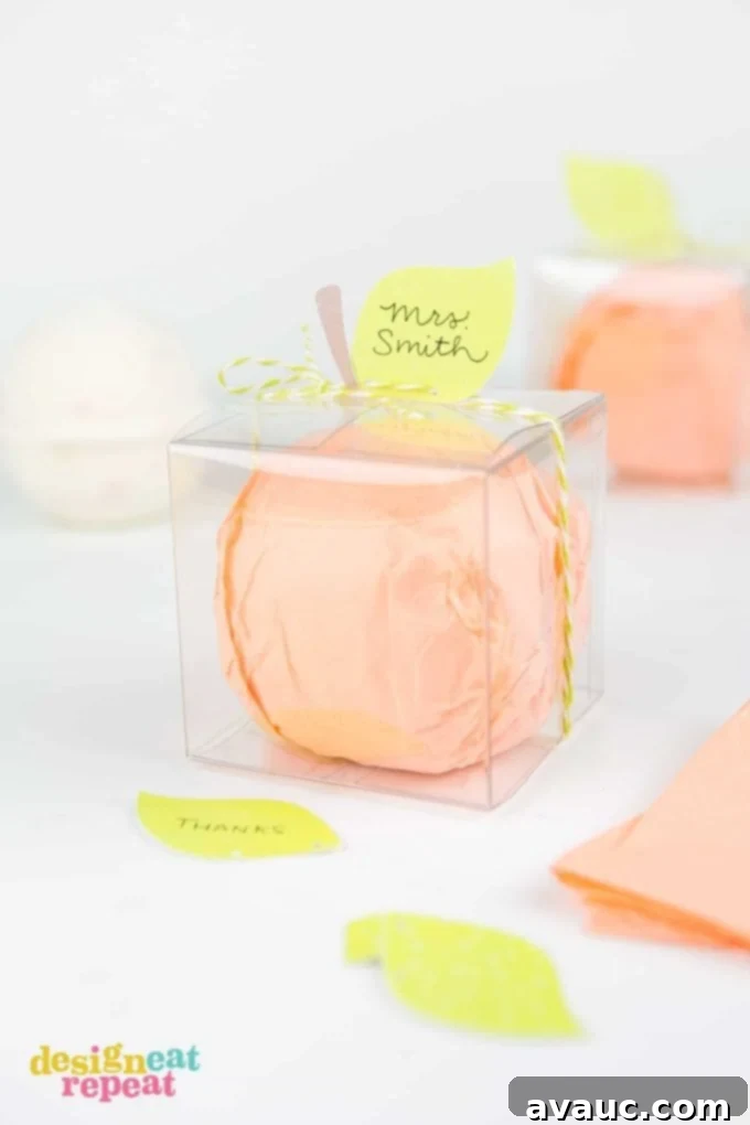 Clever Back to School Teacher Gifts Under Ten Bucks 12 Peach bath bomb teacher gift with a decorative tag.