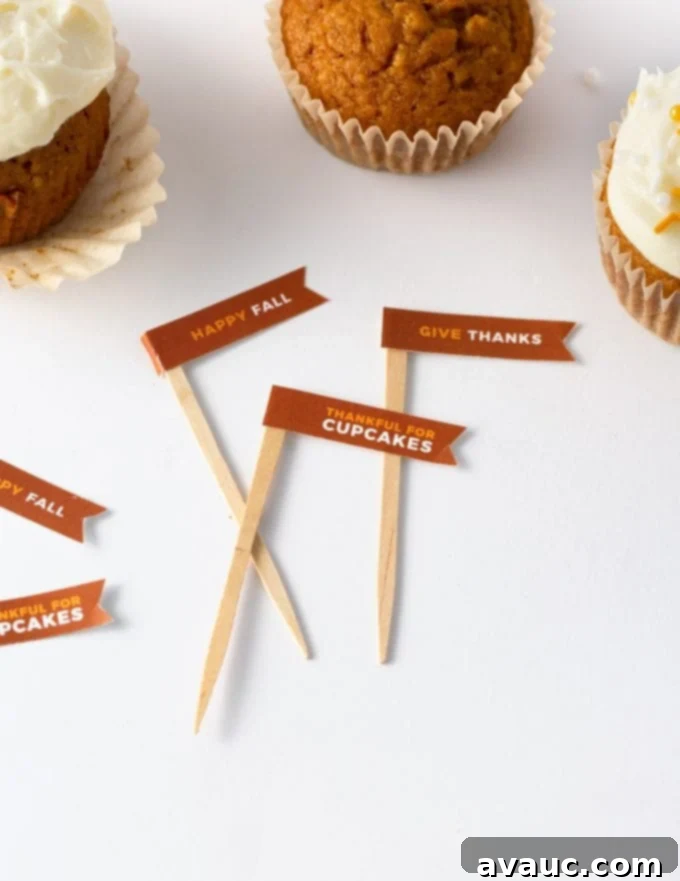 Thanksgiving Cupcake Delights 4 Detailed view of printable Thanksgiving cupcake toppers being cut and attached to toothpicks, showcasing the assembly process.