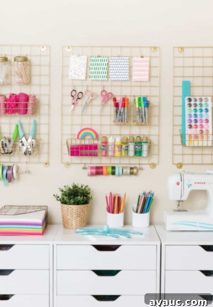 A vibrant and organized craft room with white storage drawers and colorful supplies.