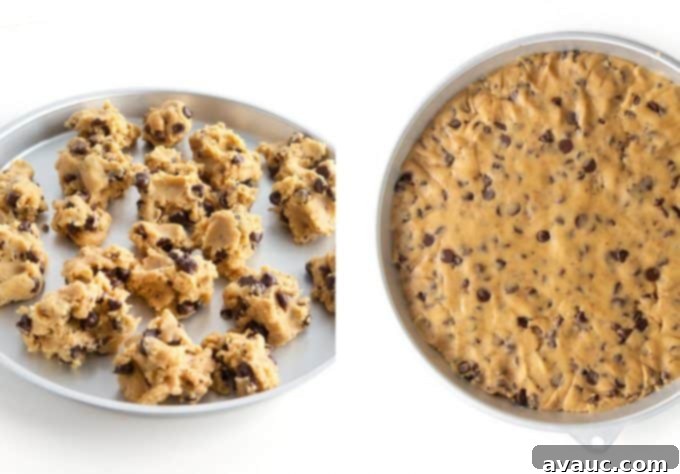 Cookie cake dough pressed evenly into a round pan, ready for baking