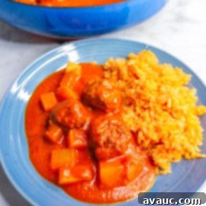 Albondigas in Chipotle Sauce on a plate with Mexican rice