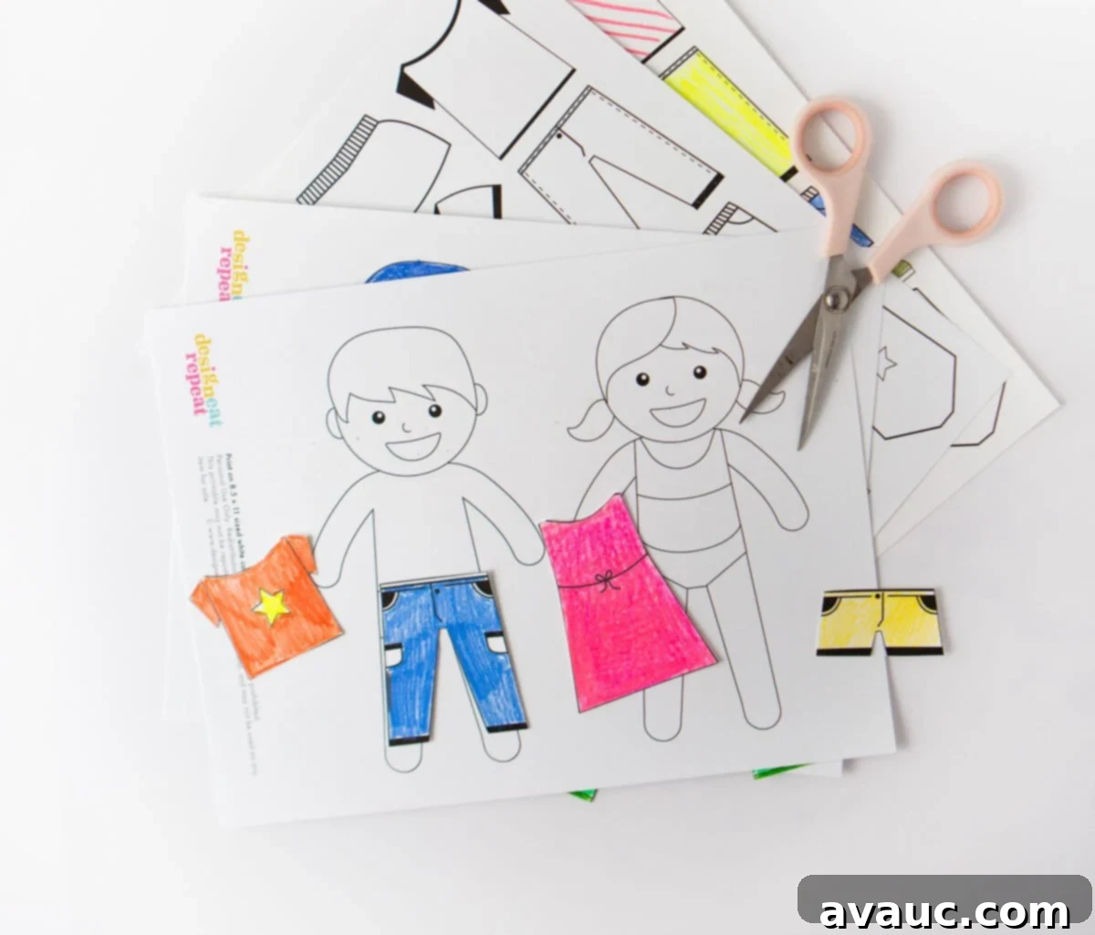 A child engrossed in coloring a paper doll's dress with colorful markers, demonstrating the creative process