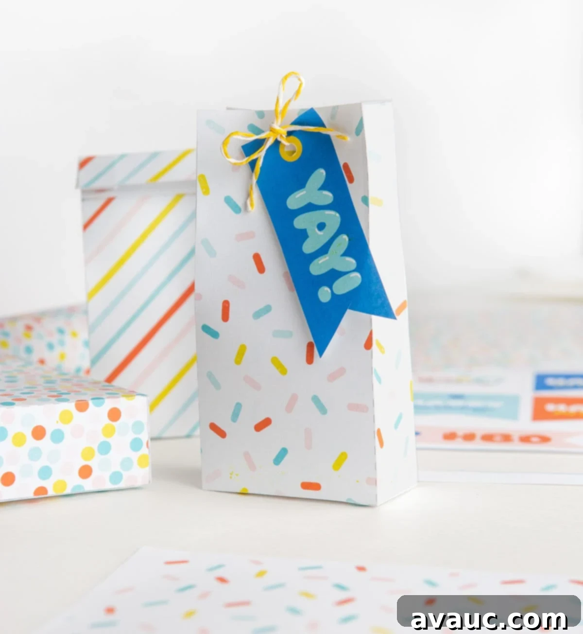 Colorful sprinkle printable treat bag with blue YAY birthday printable gift tag