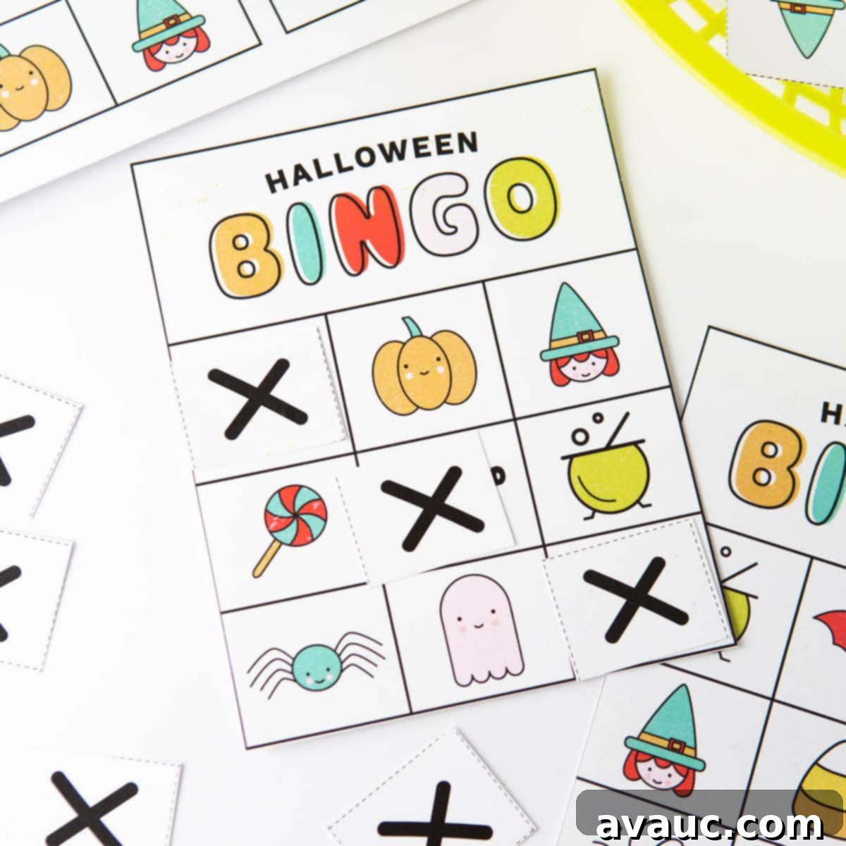 A festive Christmas bingo setup with a caller's basket, bingo cards, and markers.