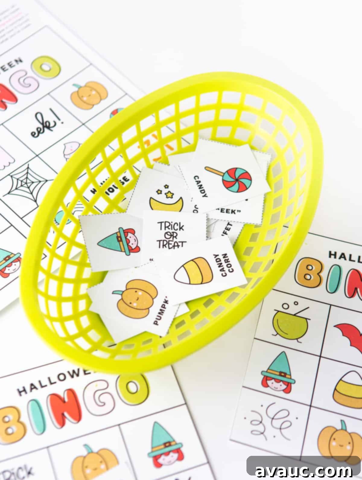 Spooktacular Halloween Bingo Fun 5 Basket of Halloween bingo cards calling cards with icons and pictures: pumpkin, witch, lollipop, cauldron, spider, ghost