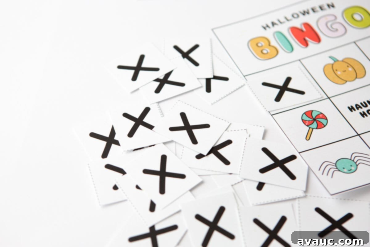 Spooktacular Halloween Bingo Fun 6 Printable bingo tokens, black "X" for Halloween bingo cards