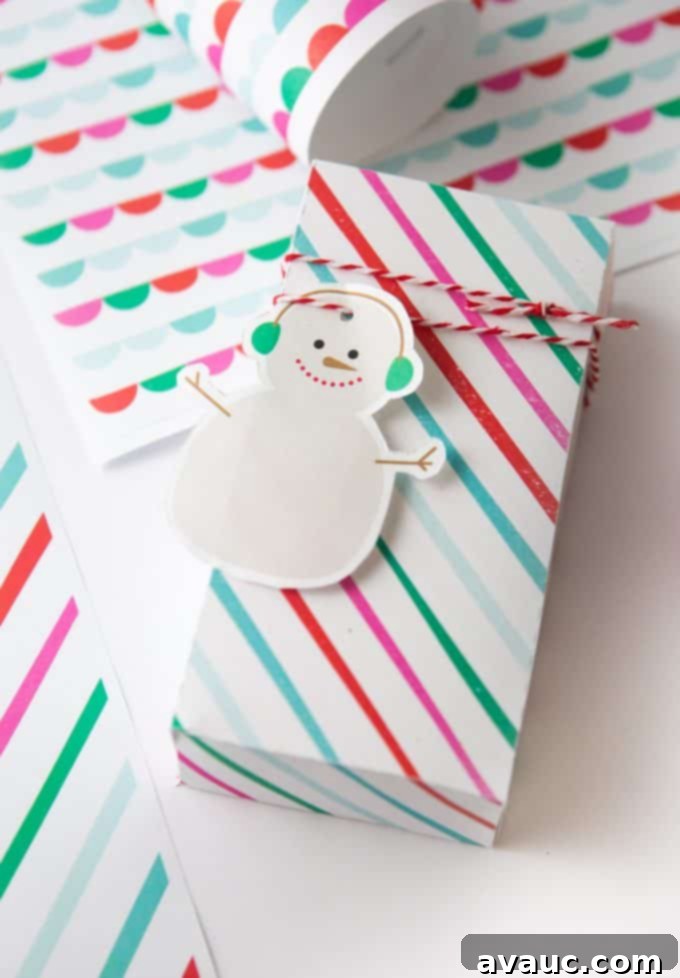 Printable snowman gift tag on striped rainbow gift box