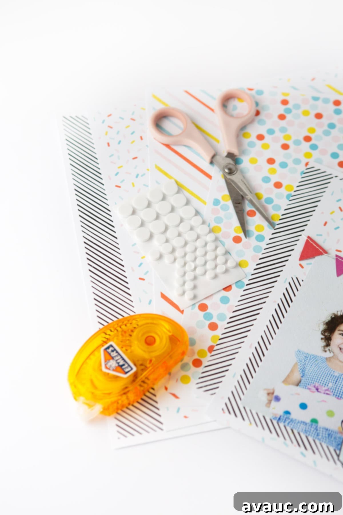 Colorful rainbow scrapbook page design with Happy Birthday text, cupcake, and banner