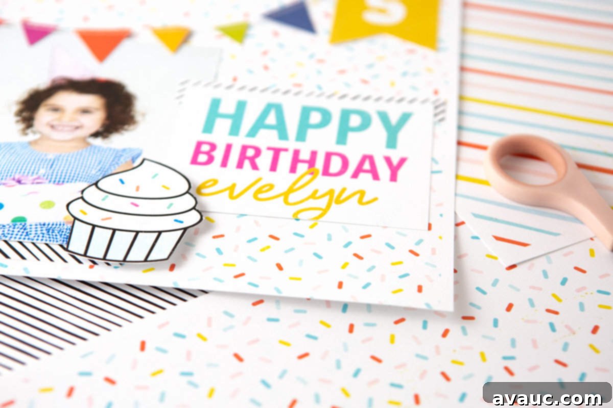 Colorful rainbow scrapbook page design with Happy Birthday text, cupcake, and banner