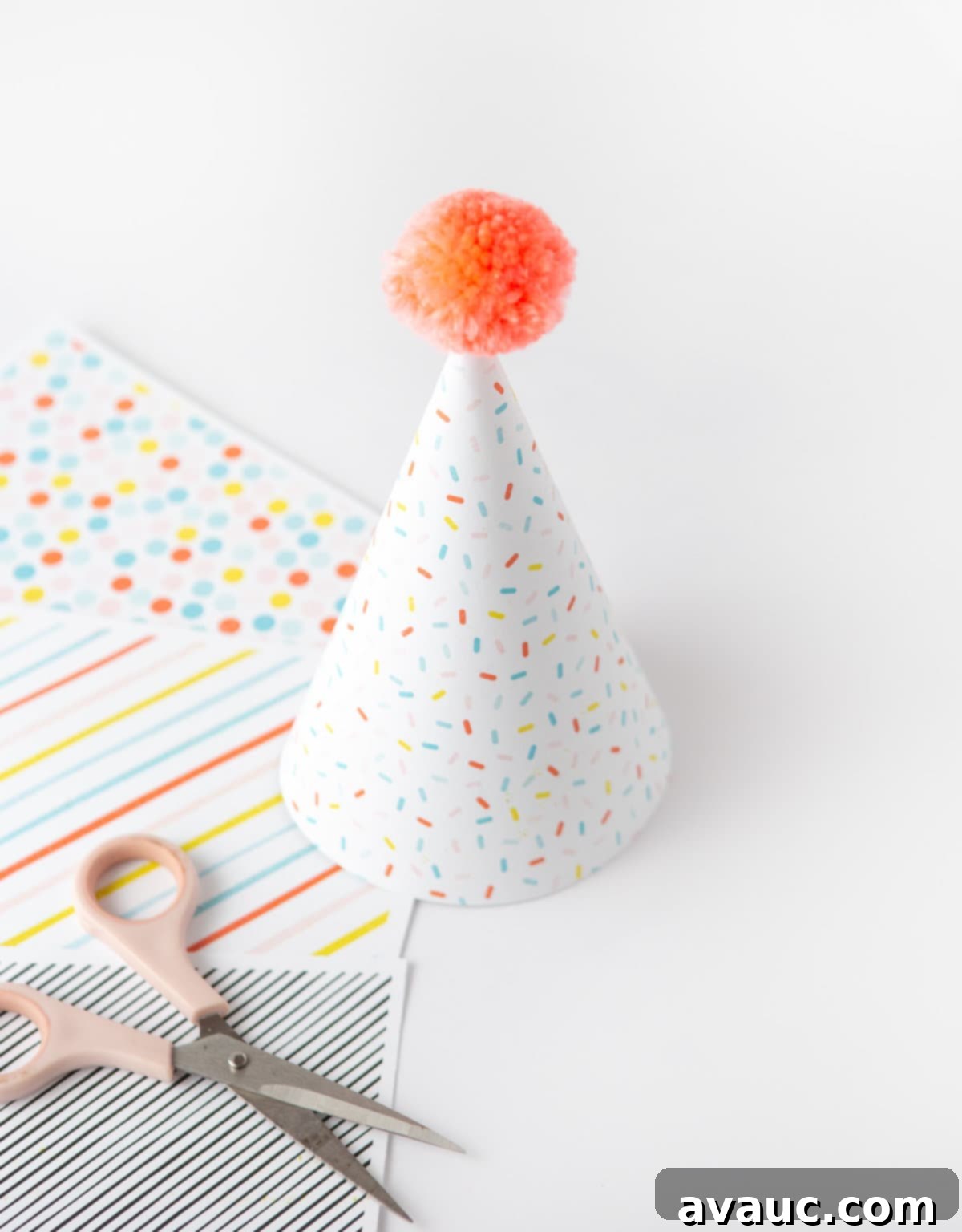 Sprinkle pattern party hat made with printable scrapbook paper