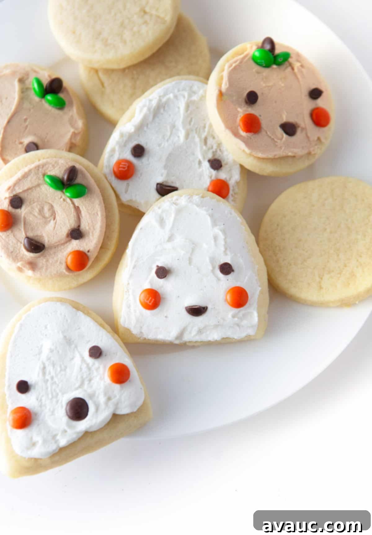 Spooktacularly Simple Pumpkin Cookies 9 Easy Halloween pumpkin and ghost cookies decorated with M&M's side by side