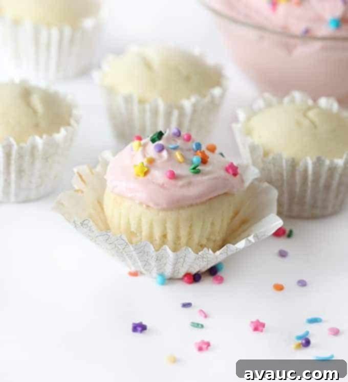 Perfect White Sheet Cake Box Mix Upgrade 11 white cupcake with pink frosting and sprinkles in cupcake liner