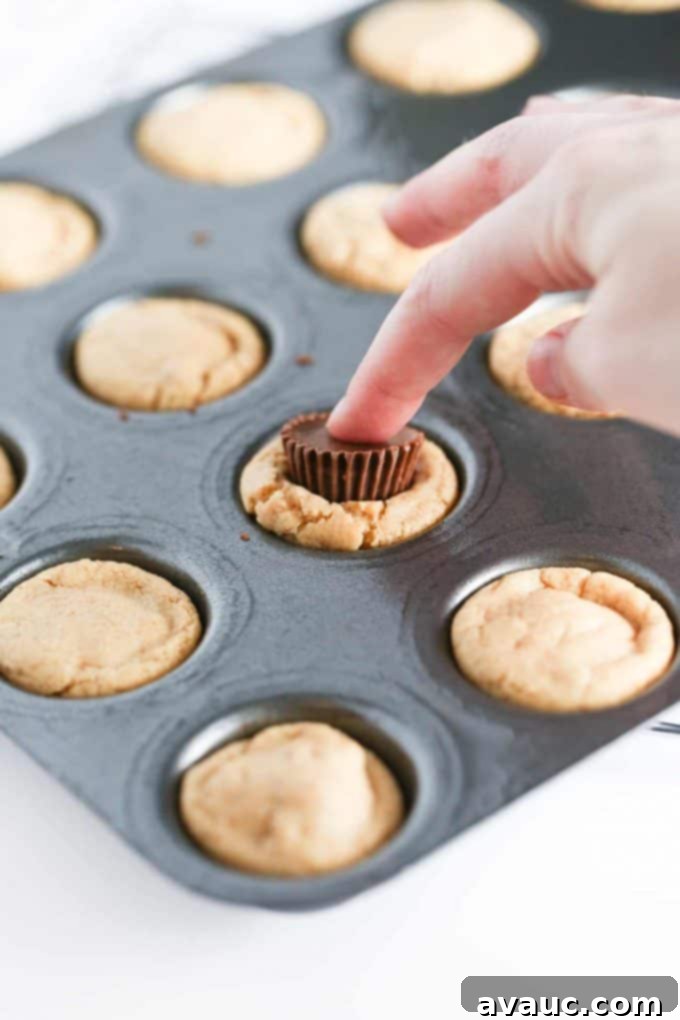 Press Reeses Peanut Butter Cups in Valentines Cookie Cups