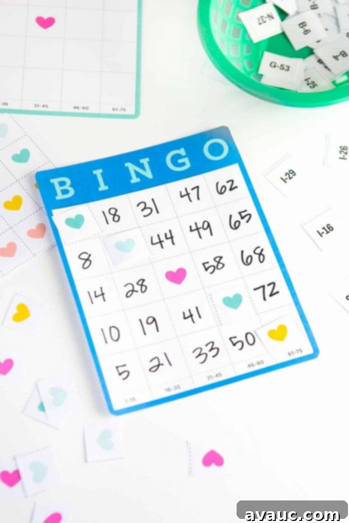 Fill-in-the-blank blue bingo cards, awaiting customization, with heart-shaped tokens for a personalized game experience.