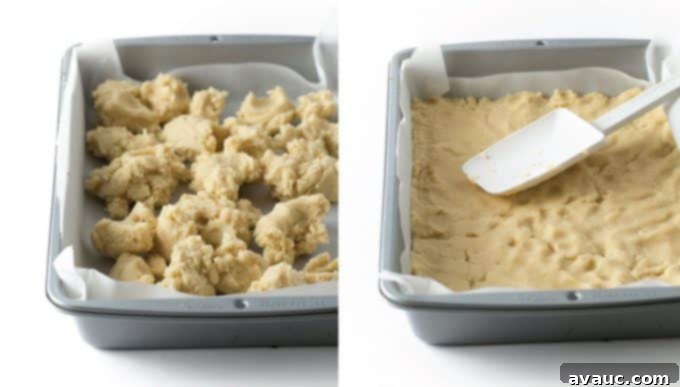 How to press sugar cookie dough into 9x13 pan with a spatula to create an even layer