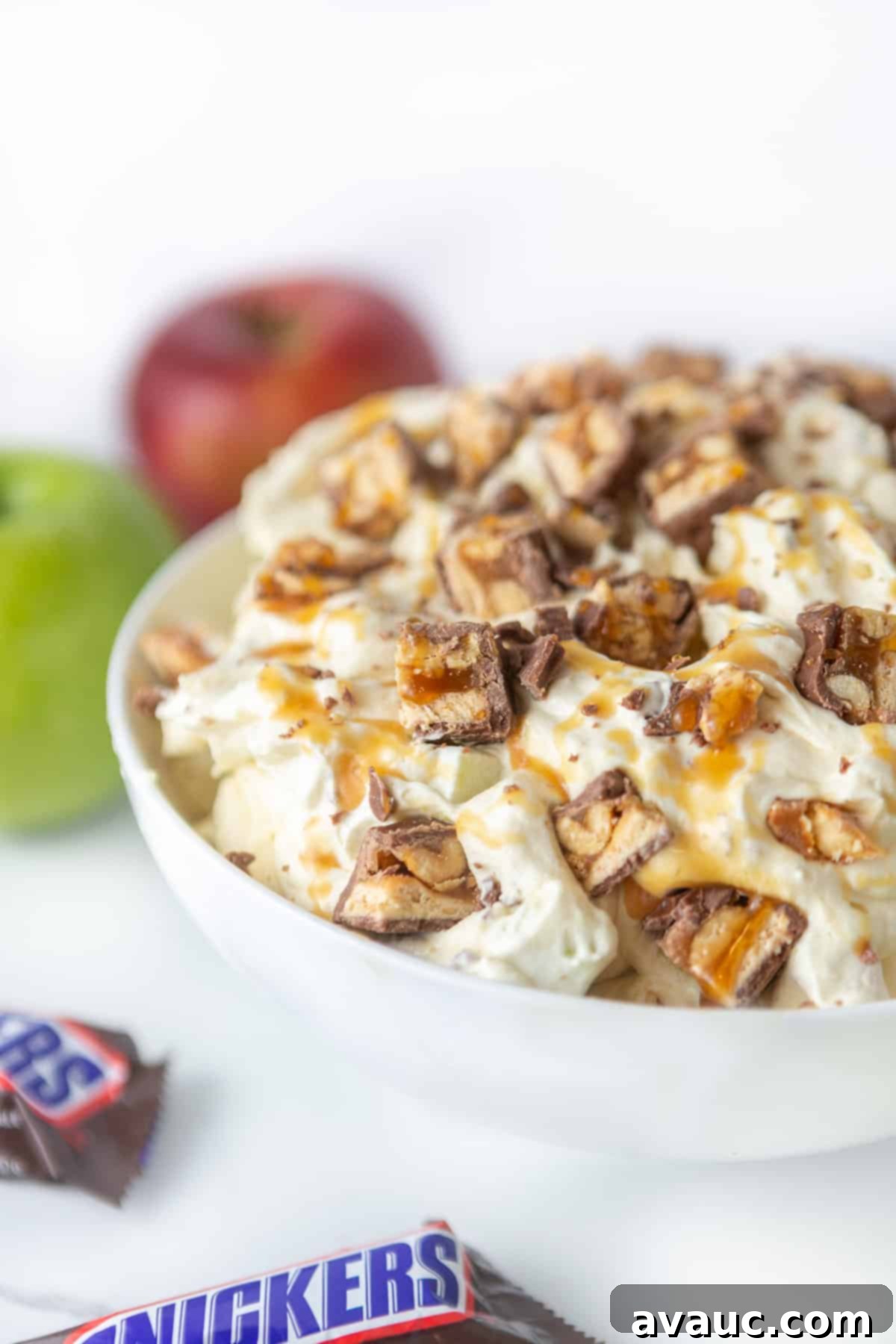 Bowl of creamy apple snickers salad dessert