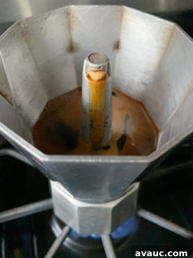 Cocoa Espresso Bliss 4 Making strong coffee in a Moka pot, a key step for homemade mocha latte