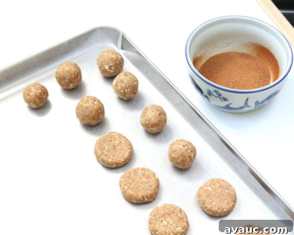 Healthy gluten-free kid snacks being coated with a cinnamon-sugar mixture.