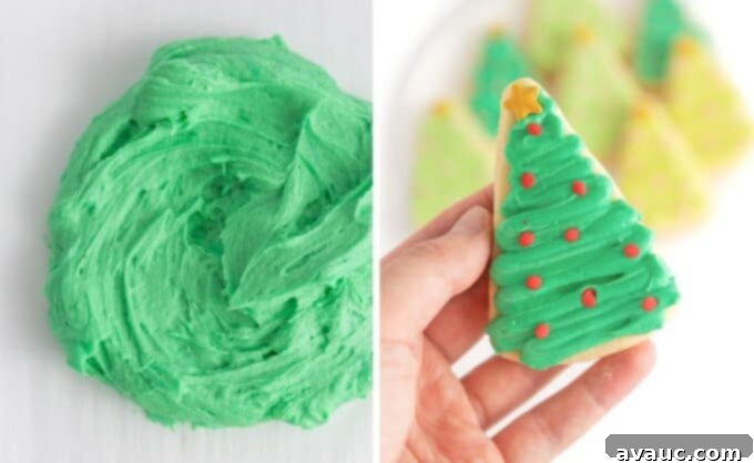 Bowl of green frosting next to hand holding green christmas tree sugar cookie