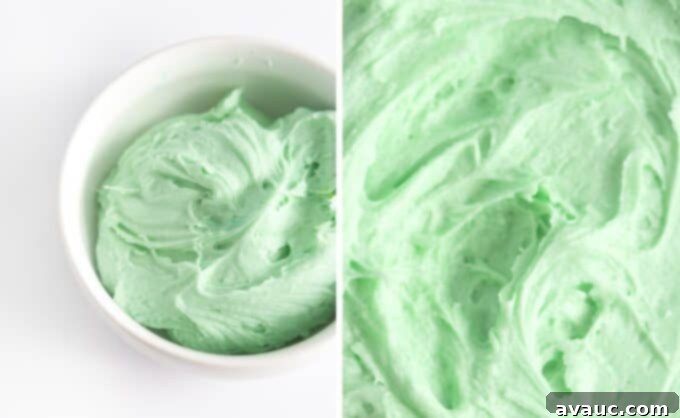 Bowl of mint green frosting next to a mint green cookie