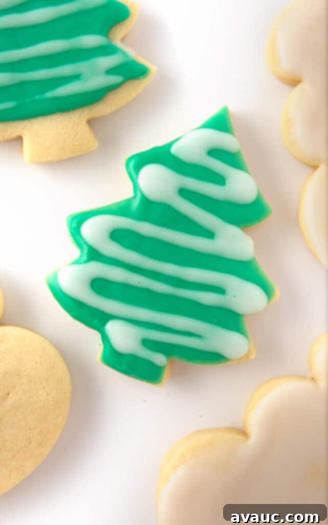 Quick and Easy Sugar Cookie Glaze 9 green christmas tree sugar cookie with white drizzle