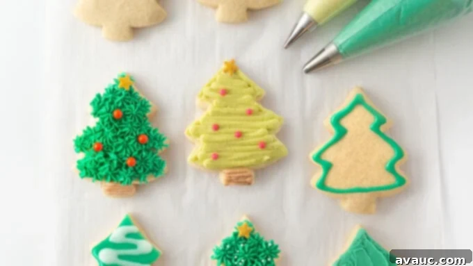 Simple Ways to Decorate Christmas Tree Cookies 9 A beautiful array of decorated Christmas tree cookies, showcasing various easy techniques and festive toppings like sprinkles and sanding sugar, arranged on a white serving platter