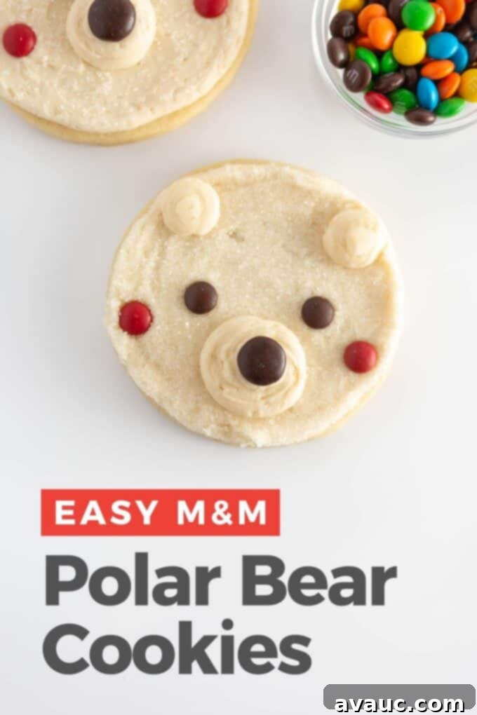 Cute and Simple Polar Bear Cookies 2 Easy polar bear cookies decorated with M&M candy, showcasing adorable polar bear faces perfect for Christmas baking.