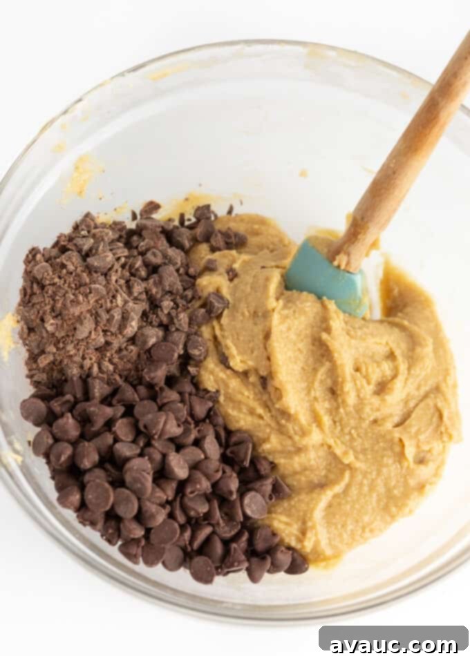 Unbelievably Chewy Gluten-Free Cookie Cake 8 mixing chocolate chip cookie cake dough