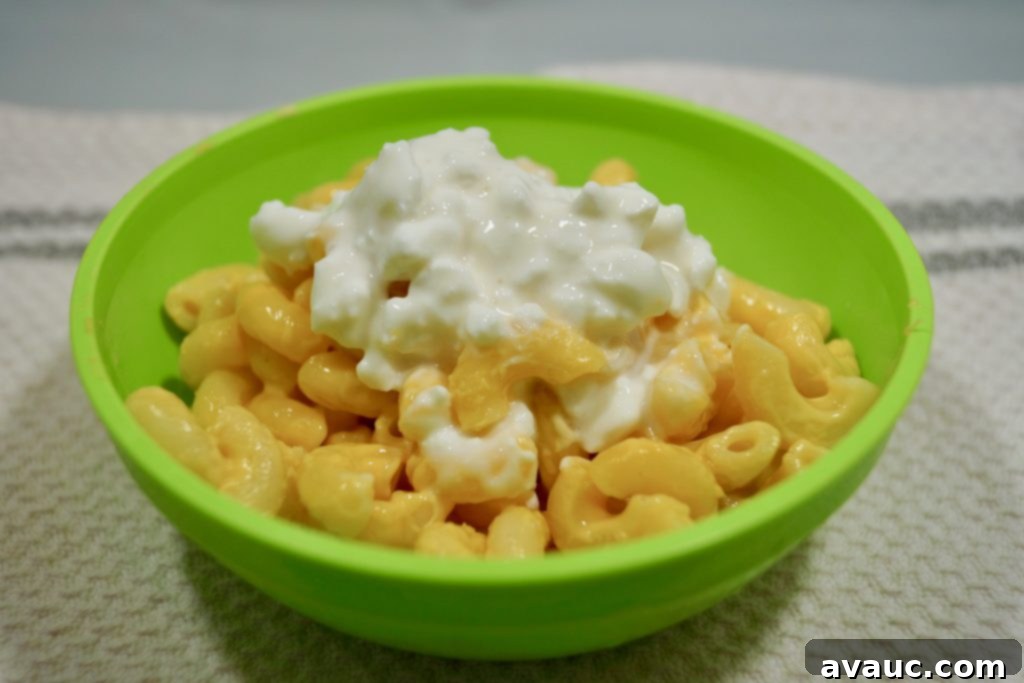 Boxed mac and cheese mixed with cottage cheese for added protein and creaminess