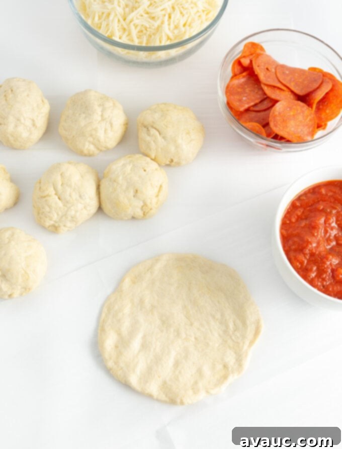 Easy Mini Pizzas for Little Chefs 8 rolling dough into 8 balls and flattening into thin crusts