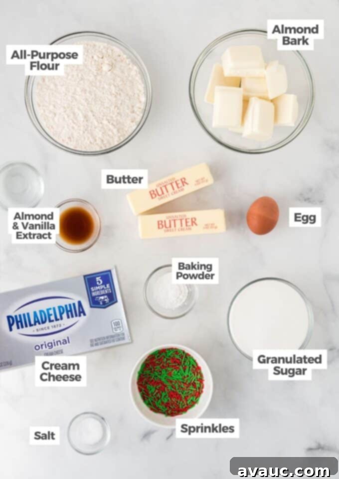 Gourmet Sugar Cookie Truffles 4 ingredients laid out for making sugar cookie truffles: cream cheese, almond bark, and sugar cookie crumbs