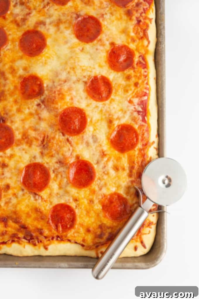 Pillowy One-Pan Pizza 10 fluffy sheet pan pizza with pepperoni