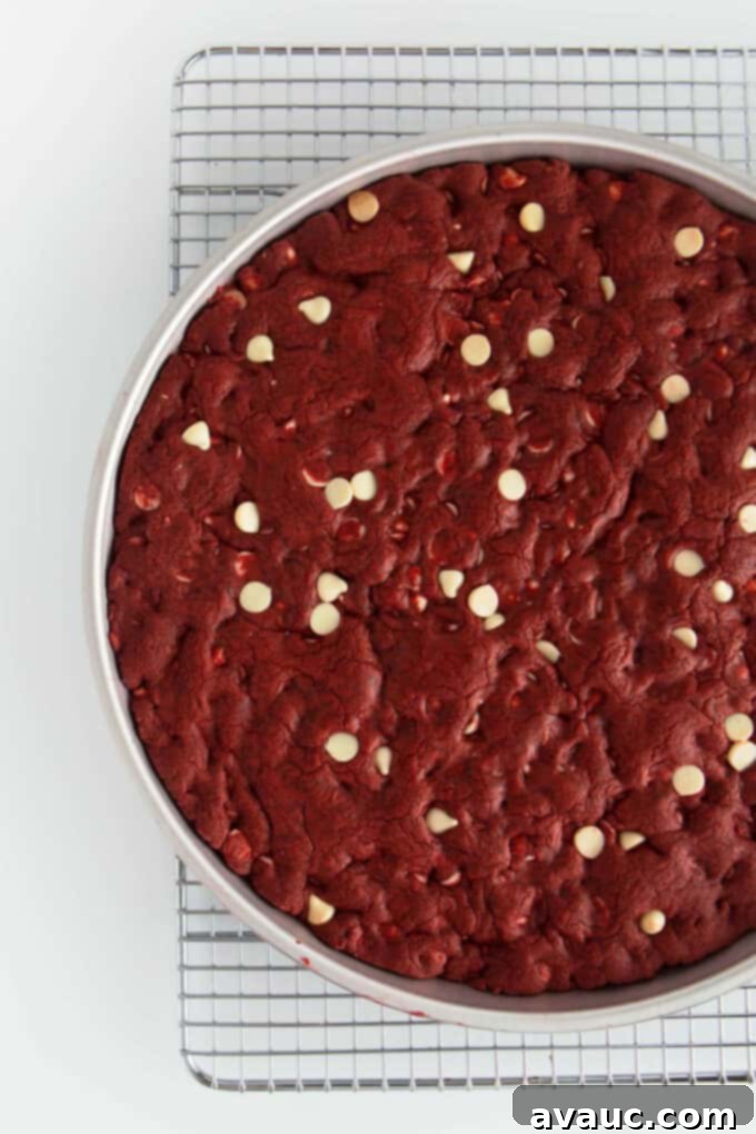 Decadent Red Velvet Cookie Cake 9 Baked red velvet cookie cake cooling in its pan.