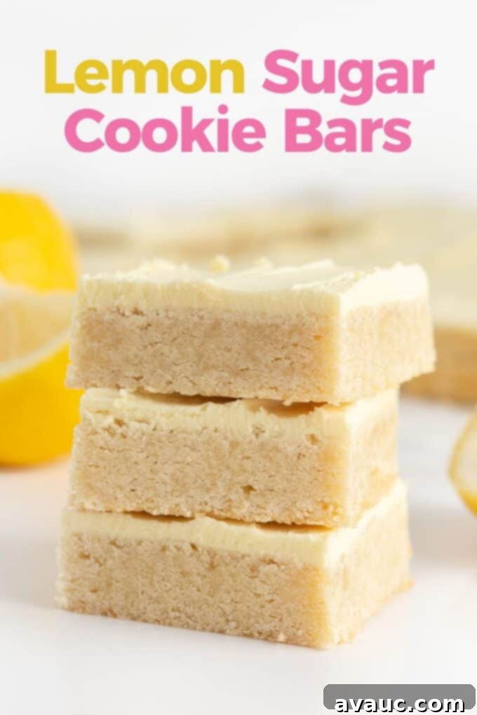 Stack of soft and delicious lemon sugar cookie bars with tangy buttercream frosting, ready to serve.