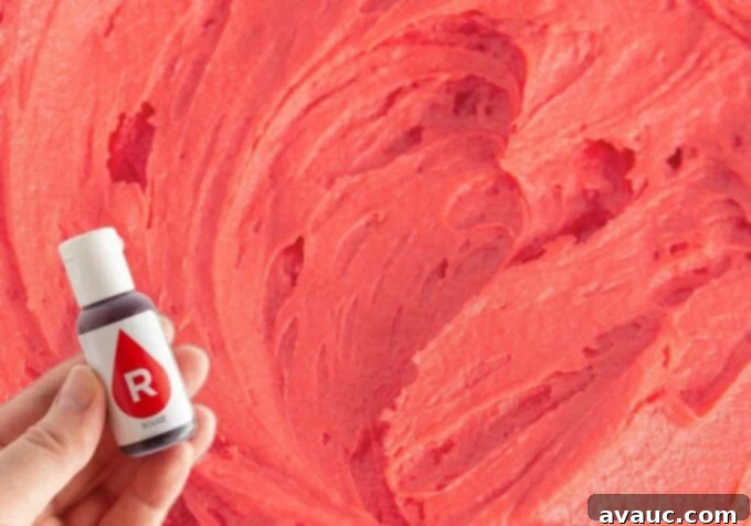 Close-up of bright pink frosting made with red food coloring
