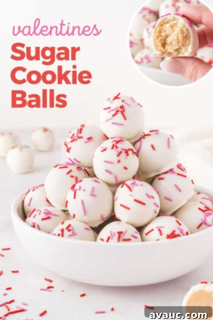 Valentines Day Sugar Cookie Truffles 2 Beautifully arranged sugar cookie Valentine truffles, dipped in white chocolate and adorned with red and pink sprinkles, ready for a festive celebration.