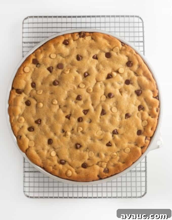 Decadent Peanut Butter Cookie Cake 7 Baked peanut butter cookie cake cooling in the pan