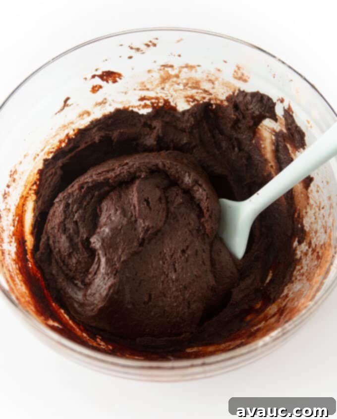 Melting butter and sugars for cosmic brownies
