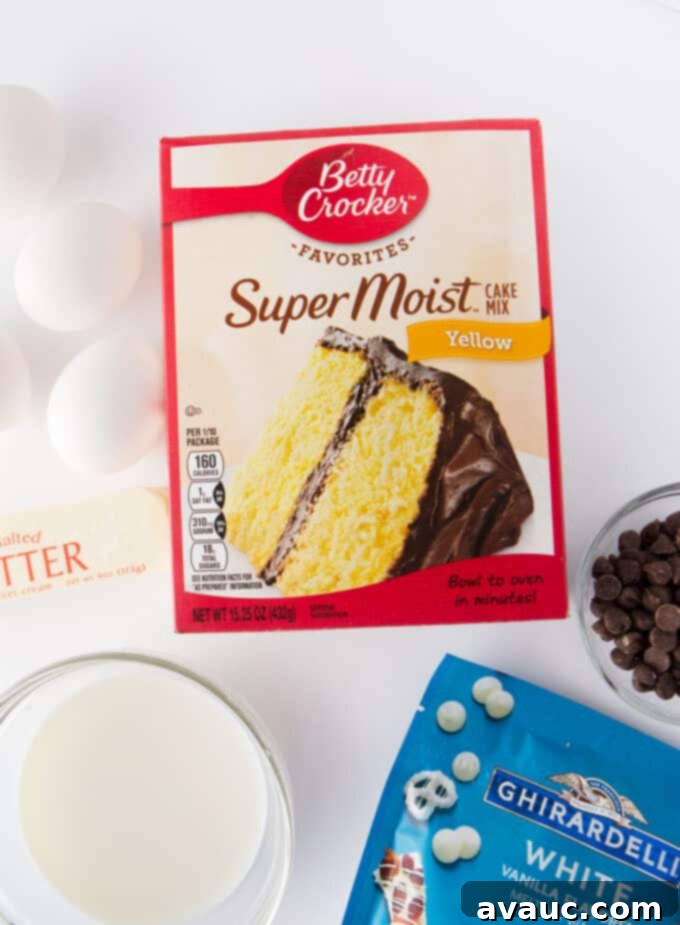 Various ingredients for baking homemade Zebra Cakes, including cake mix, butter, eggs, and chocolate, arranged neatly on a surface.