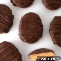 Irresistible Homemade Peanut Butter Eggs 8 Perfectly dipped and decorated homemade peanut butter eggs on a white background, ready to be enjoyed