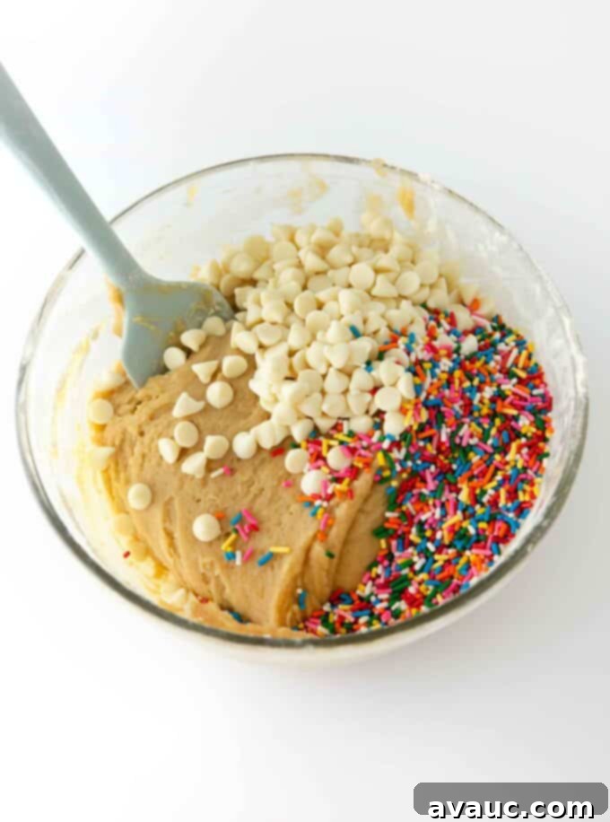 Delicious Thick and Chewy Funfetti Blondies 4 Pile of funfetti blondies on a cooling rack