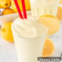 Homemade Chick-fil-A Frosted Lemonade 11 Glass of copycat Chick-fil-A frosted lemonade with red straws.