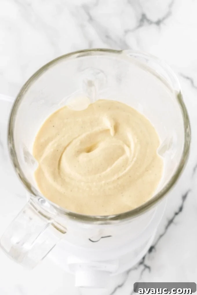 Homemade Chick-fil-A Frosted Lemonade 9 Creamy frosted lemonade blending in a blender.