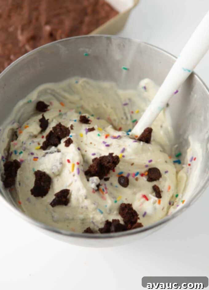 A small bowl containing cake batter extract, showing its clear liquid form.